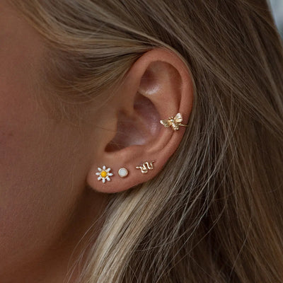 Daisy-sett med ørepynt og armbånd